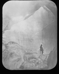 Image of Man standing on iceberg